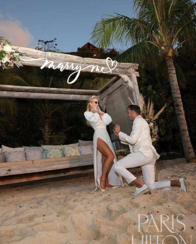 希尔顿大小姐第四次订婚!裹月光银长裙难得美翻<strong></p>
<p>卡特币</strong>,戴1300万婚戒真壕